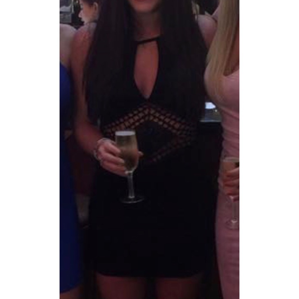 Black body-con dress with mid knit details